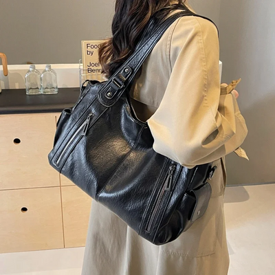Ledertasche – Damen-Umhängetasche aus Kunstleder in Schwarz und Braun