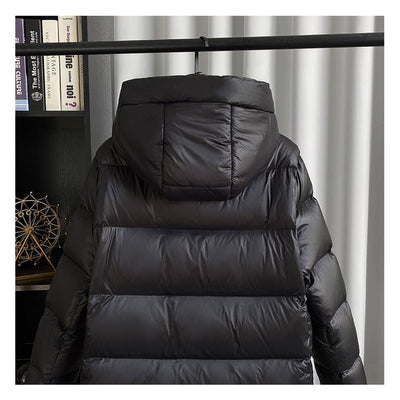 Lange pufferjas | Met capuchon | Waterdicht | Lange gewatteerde jas | Winterjas voor dames