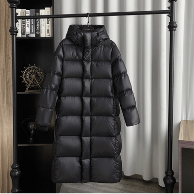 Lange pufferjas | Met capuchon | Waterdicht | Lange gewatteerde jas | Winterjas voor dames